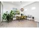 Bright dining area with built-in bench seating, wood table, and large window views at 17054 W Saguaro Park Ln, Surprise, AZ 85387