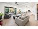 Bright and airy living room showcasing the home's open layout and inviting atmosphere at 17054 W Saguaro Park Ln, Surprise, AZ 85387