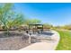 Neighborhood park with picnic spot, perfect for outdoor gatherings and enjoying the community's recreational amenities at 17054 W Saguaro Park Ln, Surprise, AZ 85387