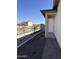 Close up of the front entrance, showing a white door, and a walkway paved with brick pavers at 18225 W Larkspur Dr, Goodyear, AZ 85338