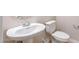 Bathroom featuring a pedestal sink and toilet with neutral color at 18840 N 269Th Ave, Buckeye, AZ 85396