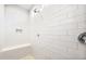 Bright, modern shower with white subway tile, built-in bench and niche at 18840 N 269Th Ave, Buckeye, AZ 85396