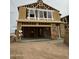 This house is under construction; it's a framed shell with a two car garage and three windows at 1984 E Bucking Bronco Dr, San Tan Valley, AZ 85140