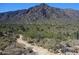 Scenic desert landscape view with a rocky mountain backdrop, highlighting the natural beauty at 20237 W San Juan Ave, Litchfield Park, AZ 85340