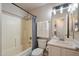 The Bathroom features a shower-tub combo, a white vanity and nice neutral tones at 20501 N 93Rd Ave, Peoria, AZ 85382