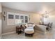 Cozy dining area with shuttered windows, chandelier, and classic furnishings at 20501 N 93Rd Ave, Peoria, AZ 85382