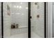 Bathroom with white subway tile shower, bench, and shower niche at 20839 E Kingbird Dr, Queen Creek, AZ 85142