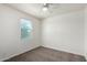 Bedroom featuring neutral walls, carpet and a window at 21412 W Hubbell St, Buckeye, AZ 85396