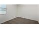 Bedroom featuring neutral walls, carpet and a window at 21412 W Hubbell St, Buckeye, AZ 85396