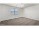 Bedroom with carpet, window and ceiling fan at 21412 W Hubbell St, Buckeye, AZ 85396