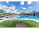 Gorgeous community pool with splash pad, lounge chairs and shaded picnic areas at 21412 W Hubbell St, Buckeye, AZ 85396