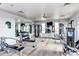 Community fitness center featuring modern equipment, mirrors and flat screen TVs at 21412 W Hubbell St, Buckeye, AZ 85396