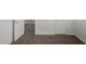 Hallway featuring carpet and multiple doors at 21412 W Hubbell St, Buckeye, AZ 85396