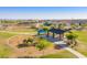 Community playground featuring modern equipment, picnic area, and lush green space for outdoor recreation at 21412 W Hubbell St, Buckeye, AZ 85396