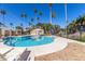 Enjoy the Arizona sun with this inviting community pool and lounging area surrounded by lush landscaping at 2232 W Lindner Ave # 20, Mesa, AZ 85202