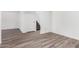 Neutral living area with stairs, gray flooring, and bright natural light from two directions at 2232 W Lindner Ave # 20, Mesa, AZ 85202