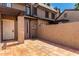 Private outdoor patio space features beautiful tiled flooring and stucco privacy wall at 2232 W Lindner Ave # 20, Mesa, AZ 85202
