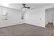 Bedroom featuring carpet, ceiling fan, recessed lighting, and large windows for ample natural light at 22472 E Sonoqui Blvd, Queen Creek, AZ 85142
