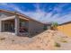 This home features a large dirt backyard with a covered patio; waiting for your custom touch at 2458 N Abbey Rd, Casa Grande, AZ 85122