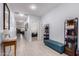 Spacious hallway with tile flooring, a small desk and ample space for decor at 2458 N Abbey Rd, Casa Grande, AZ 85122