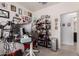 Home office featuring a large desk, shelves, and view to hallway at 2458 N Abbey Rd, Casa Grande, AZ 85122
