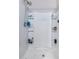 Bright white walk-in shower with built-in shelving for storage at 2458 N Abbey Rd, Casa Grande, AZ 85122