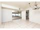 Open dining room layout with natural light and tiled flooring throughout at 2544 E Elm St, Phoenix, AZ 85016