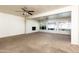 Spacious living room with a fireplace and plenty of windows for natural light at 2544 E Elm St, Phoenix, AZ 85016