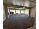 Large living room with fireplace and large windows providing ample light at 2544 E Elm St, Phoenix, AZ 85016