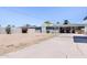 Fenced-in back yard with a concrete patio and nice landscaping at 2715 E Edgemont Ave, Phoenix, AZ 85008