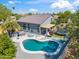 Aerial shot showcases the backyard pool, patio, and landscaping of this well-maintained property at 345 N Scott Dr, Chandler, AZ 85225