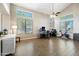 Spacious living room showcasing high ceilings, large windows, and contemporary furnishings at 345 N Scott Dr, Chandler, AZ 85225