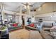 Expansive living area seamlessly connecting to the kitchen, featuring comfortable seating and high ceilings at 345 N Scott Dr, Chandler, AZ 85225