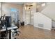 Open-concept living space with high ceilings, wood-look floors, and natural light at 345 N Scott Dr, Chandler, AZ 85225