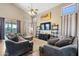 Cozy living room with comfortable seating, modern decor, and large windows for natural light at 345 N Scott Dr, Chandler, AZ 85225