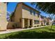 Inviting two-story home with a lush lawn, mature landscaping, and charming curb appeal at 3530 S Bandit Rd, Gilbert, AZ 85297