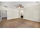 Spacious main bedroom with carpet, a ceiling fan, and an ensuite bathroom at 3530 S Bandit Rd, Gilbert, AZ 85297