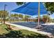 Community playground with a large shade canopy, swing sets, and climbing structures for children at 3530 S Bandit Rd, Gilbert, AZ 85297