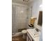 Updated bathroom with tiled shower, modern fixtures, and neutral color scheme at 3539 W Davidson Ln, Phoenix, AZ 85051