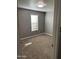 Neutral bedroom with new carpet, a window for natural light, and fresh paint at 3539 W Davidson Ln, Phoenix, AZ 85051