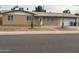 Charming single-story brick home with a well-maintained front yard and attached two-car garage at 3539 W Davidson Ln, Phoenix, AZ 85051