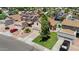 Overhead view of a home with a well-manicured lawn, two-car garage, and desert landscaping at 3608 W Harrison St, Chandler, AZ 85226
