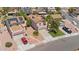 Two-story home showcasing a well-manicured front yard and a solar panel energy system on the roof at 3608 W Harrison St, Chandler, AZ 85226