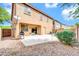 Backyard with stucco wall, BBQ grill and open patio at 3745 E Flamingo Way, Gilbert, AZ 85297