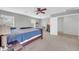 A spacious bedroom featuring large windows and carpeted floors at 3745 E Flamingo Way, Gilbert, AZ 85297