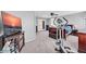Spacious bedroom with carpeted floor, ceiling fan, and doors to balcony at 3745 E Flamingo Way, Gilbert, AZ 85297