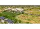 Aerial view of community amenities including athletic fields and the neighborhood school at 3745 E Flamingo Way, Gilbert, AZ 85297
