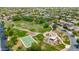 Aerial view featuring a neighborhood park with playground, basketball court, and walking trails at 3745 E Flamingo Way, Gilbert, AZ 85297