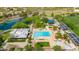 Aerial view of the community pool with resort style lounge chairs and umbrellas at 3745 E Flamingo Way, Gilbert, AZ 85297