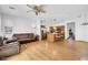 Bright and airy living room featuring hardwood floors, neutral walls, and ample space for seating at 3745 E Flamingo Way, Gilbert, AZ 85297